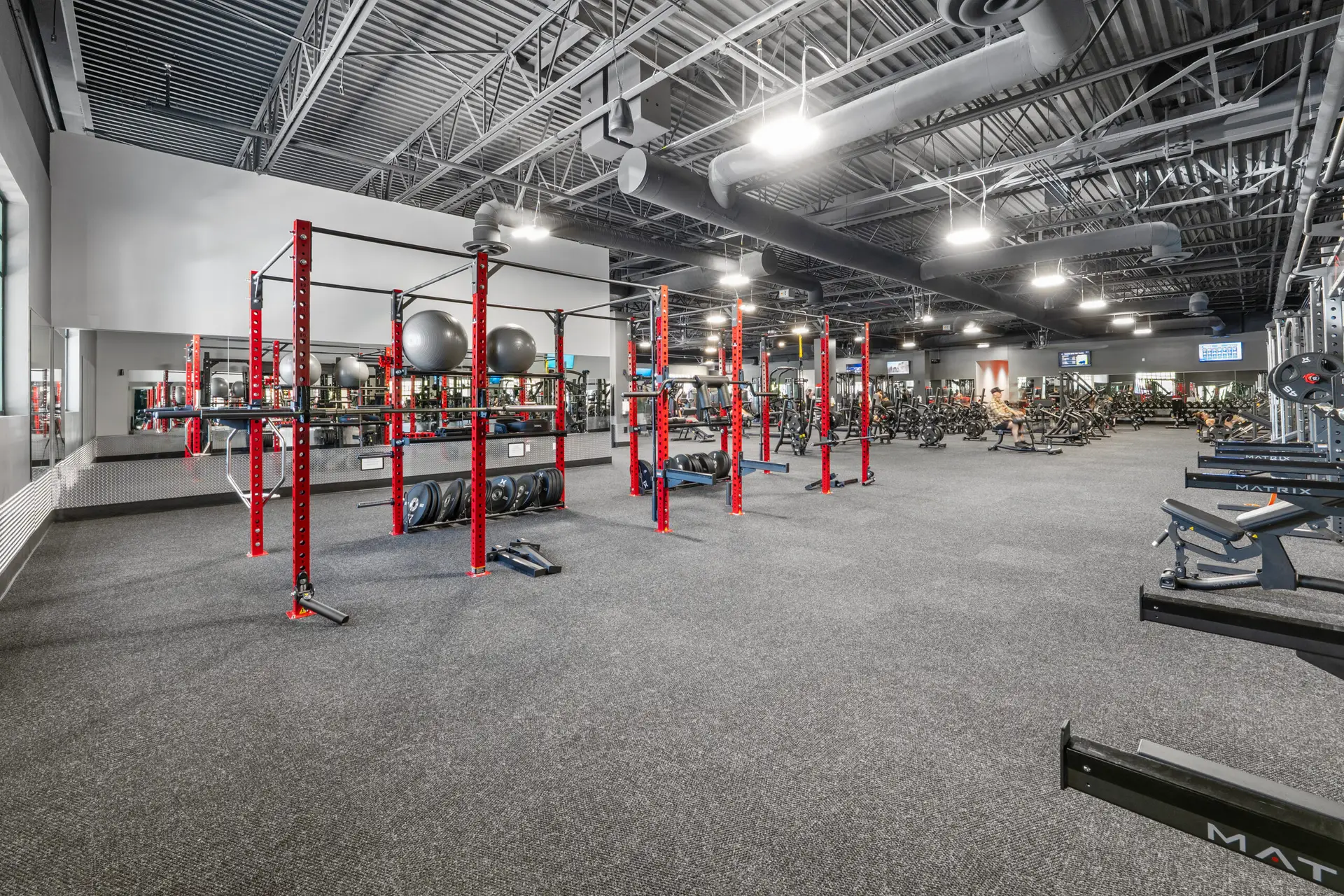 Multi purpose floor with plate loaded equipment at the Eagle Idaho Fitness Factory